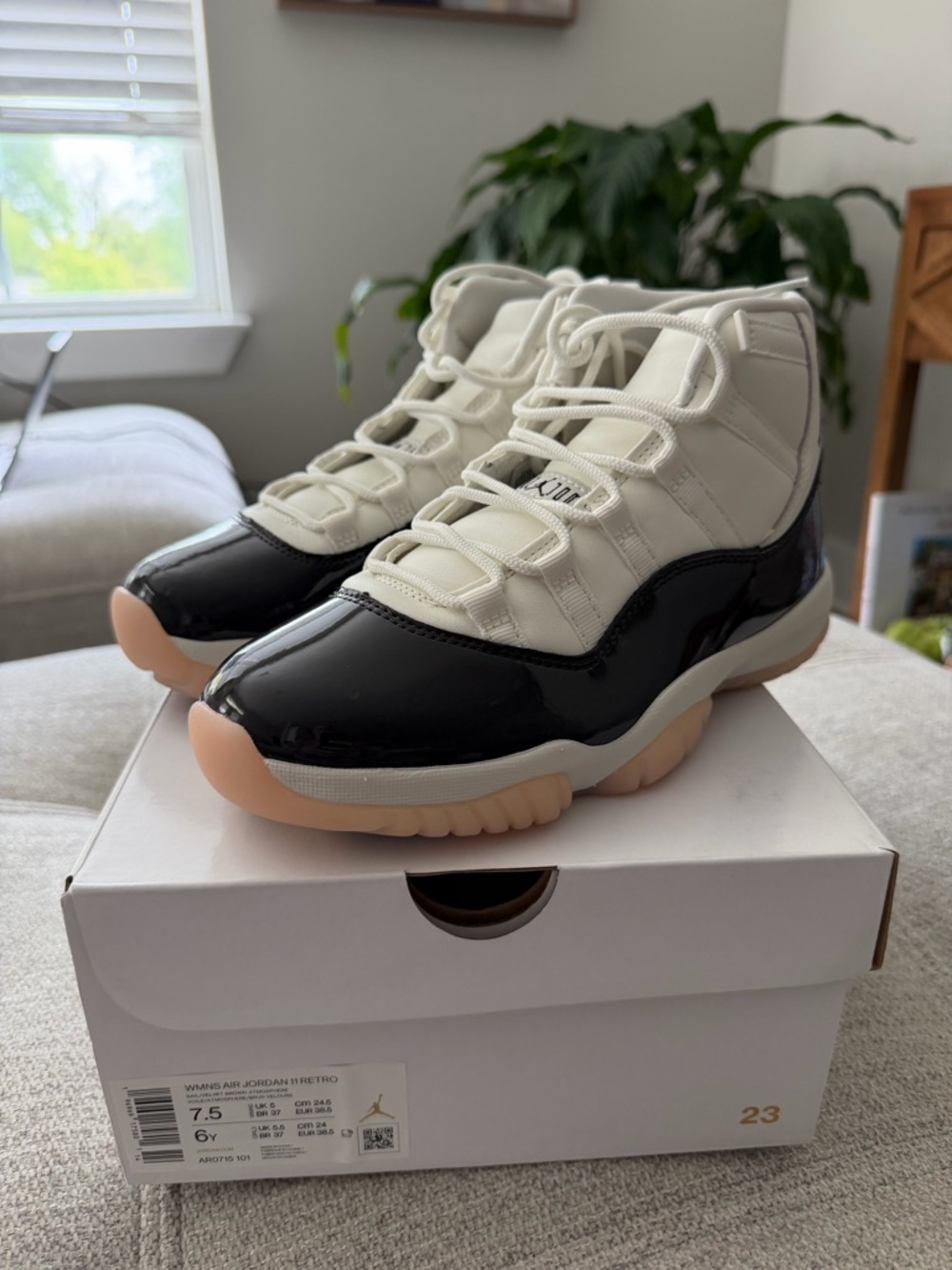 Jordan Women’s Retro 11 Sneakers in Black, Cream & Gum